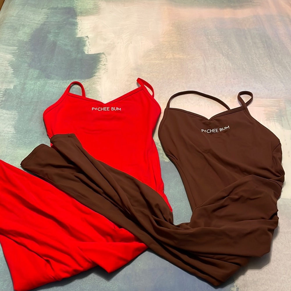 Two pchee bum full length body suits. Each only worn once. Size M.
